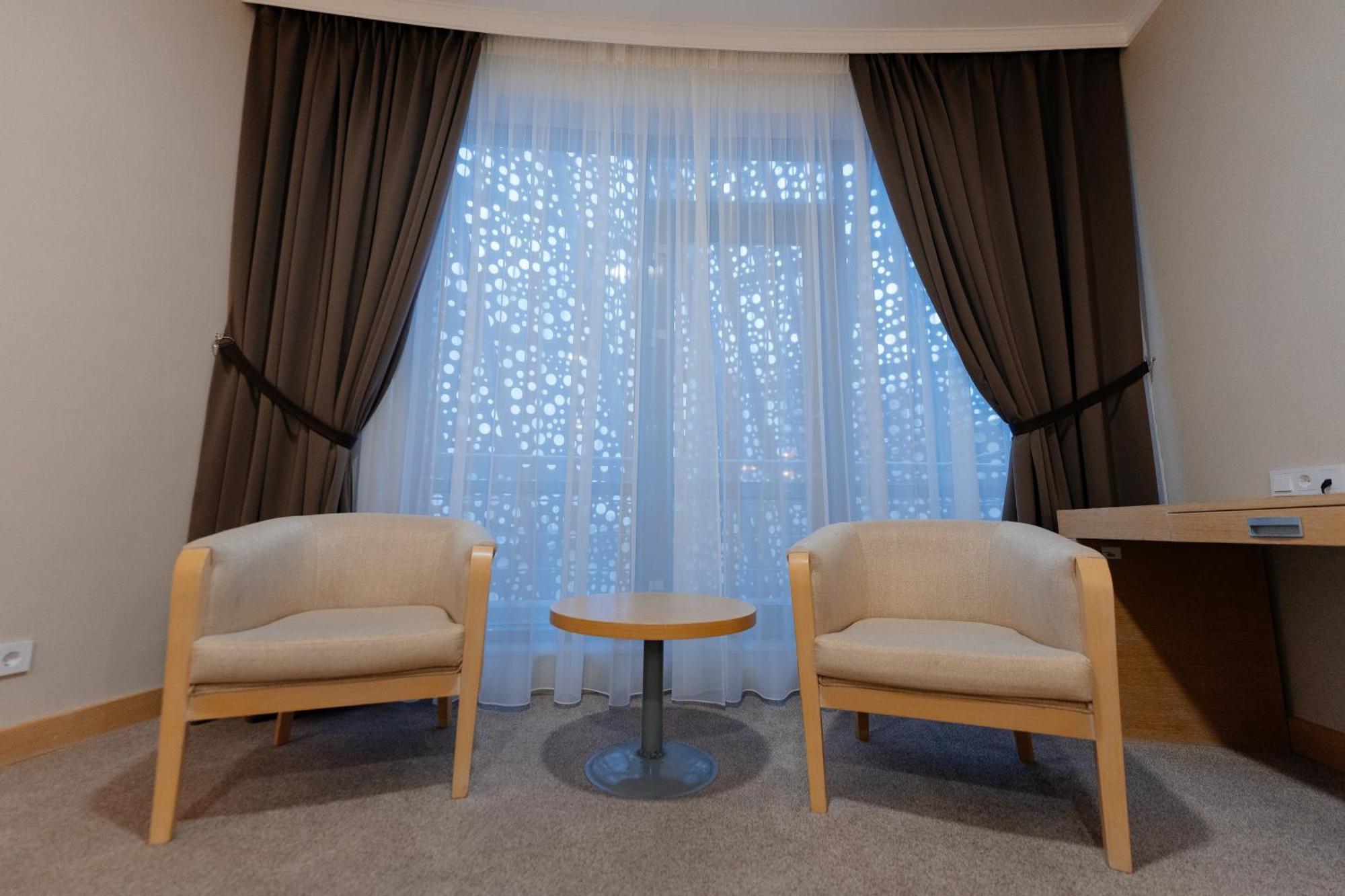 Alau Hotel Astana Eksteriør bilde